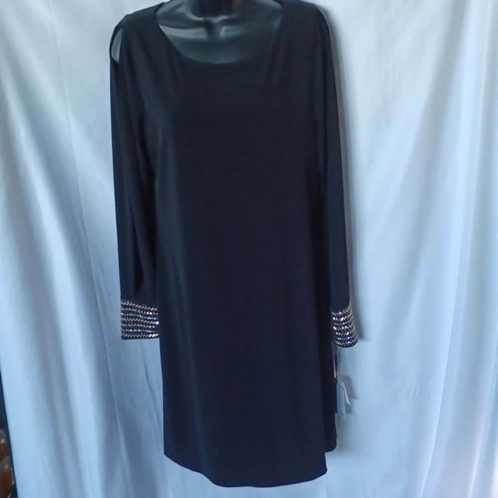 Calvin Klein Beautiful long sleeve black dress, open sleeves, beaded cuffs